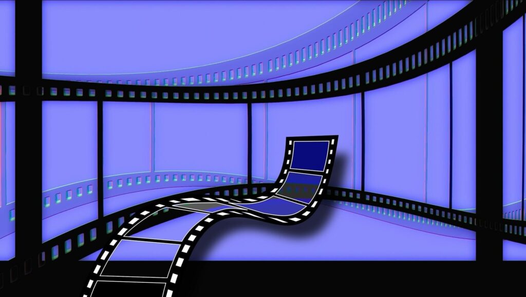 Filmstreifen vor fliederfarbenem Hintergrund, grafisch gestaltet