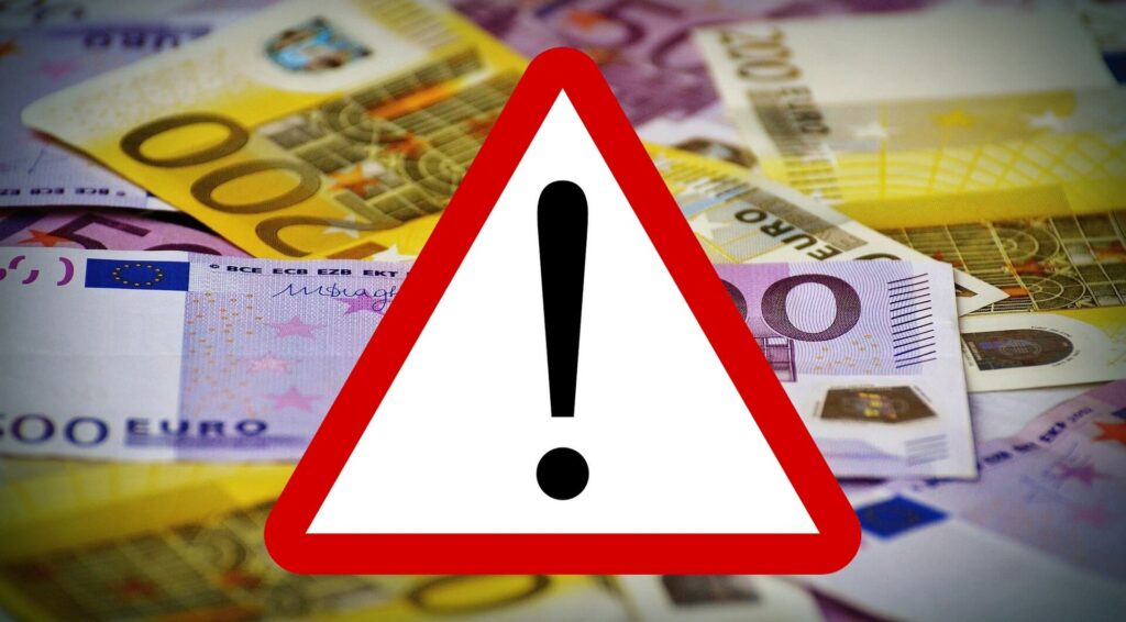 Forderung der Legalisto GmbH - Achtungszeichen + Geldscheine